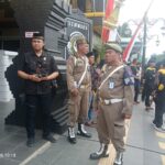 Petugas Tindak Internal Satpol PP Kabupaten Madiun Laksanakan Pengamanan Tibumtranmas dan Kawal Kepala Daerah pada Suran Agung 2025 PSHW-TM